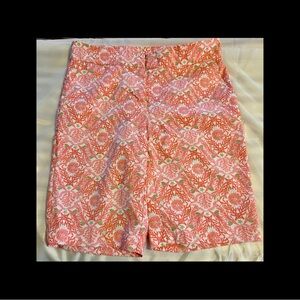 Floral Patterned Women's Golf Shorts - Coral Pink, Green, and White.